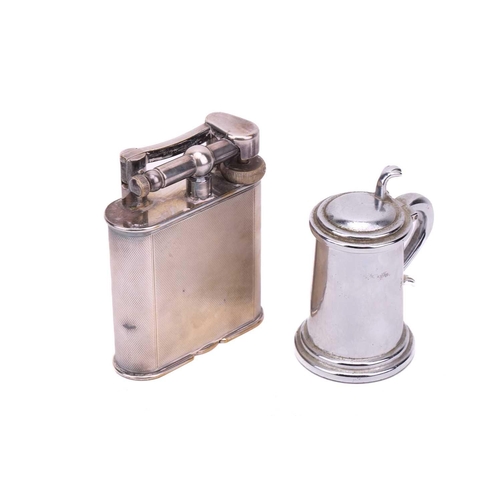 386 - Three Dunhill lighters, comprising a silver plated table lighter with engine-turned decoration, Pate... 