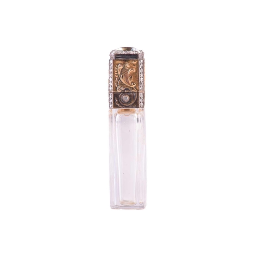 388 - A French late 19th century scent bottle set with an aquamarine and rose diamonds; the tapering panel... 