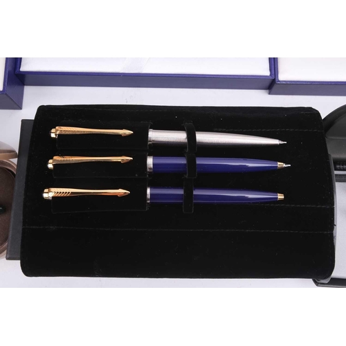 393 - A collection of boxed and cased Waterman, Parker and Shaefer fountain pens, including a metallic blu... 