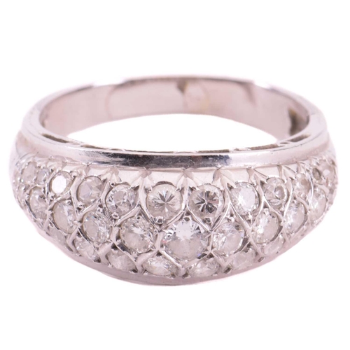 4 - A diamond dress ring, designed as a half hoop set throughout with three rows of round brilliant cut ... 