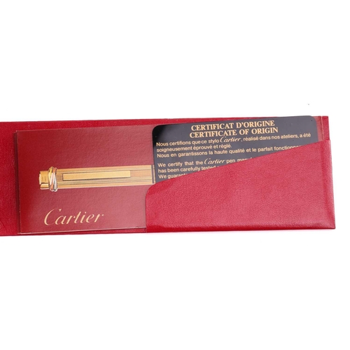 401 - Les Must de Cartier - two boxed 'Vendôme Trinity' pens of crosshatch pattern; containing one fountai... 