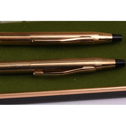 401 - Les Must de Cartier - two boxed 'Vendôme Trinity' pens of crosshatch pattern; containing one fountai... 