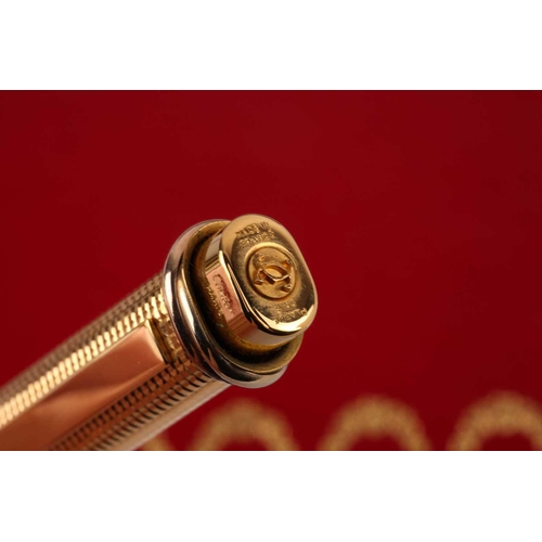 401 - Les Must de Cartier - two boxed 'Vendôme Trinity' pens of crosshatch pattern; containing one fountai... 