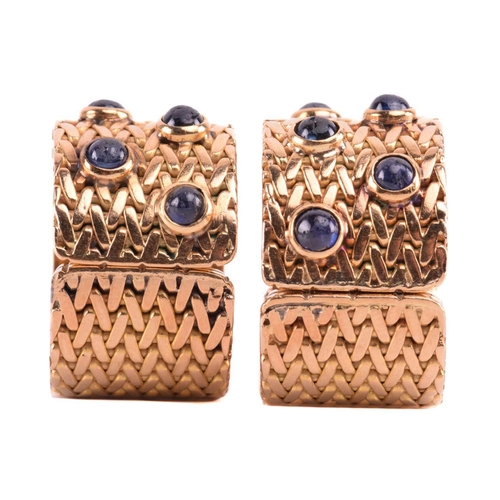 47 - A pair of sapphire clip earrings signed 'Fontana Roma', each set with cabochon sapphires to a lattic... 