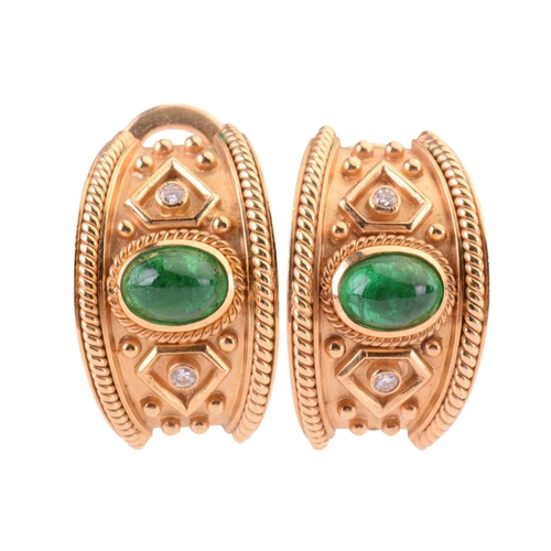 51 - A pair of emerald and diamond earrings, each set with a central cabochon emerald between round brill... 