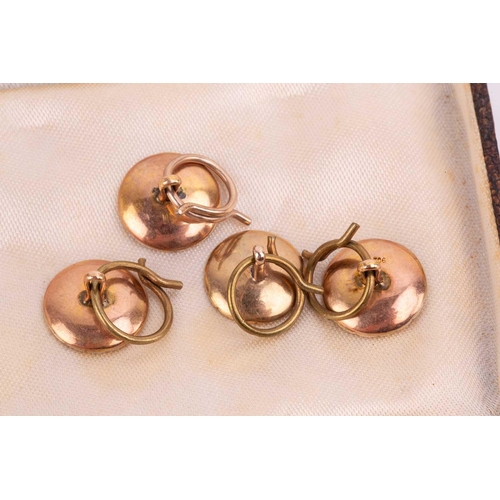 55 - An onyx and diamond dress set comprised of a pair of cufflinks, two dress studs and four buttons, in... 