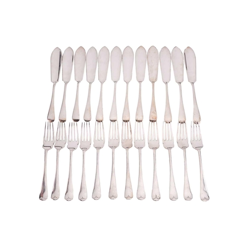 569 - An early 20th century set for twelve settings cast silver 