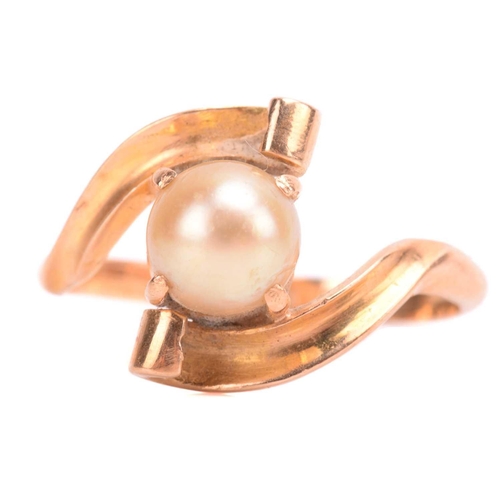 57 - A cultured pearl ring, the four claw set yellow pearl approximately 8mm diameter set in yellow metal... 