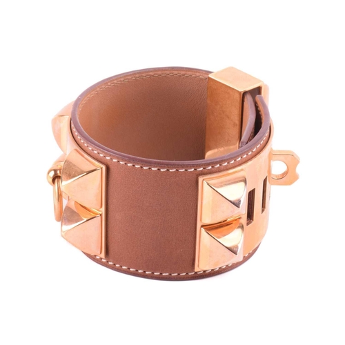 77 - Hermès - a wide 'Collier de Chien' leather bracelet with gold-tone metal, in tanned calfskin leather... 