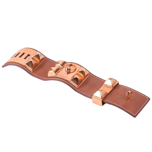 77 - Hermès - a wide 'Collier de Chien' leather bracelet with gold-tone metal, in tanned calfskin leather... 