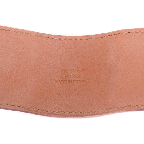 77 - Hermès - a wide 'Collier de Chien' leather bracelet with gold-tone metal, in tanned calfskin leather... 