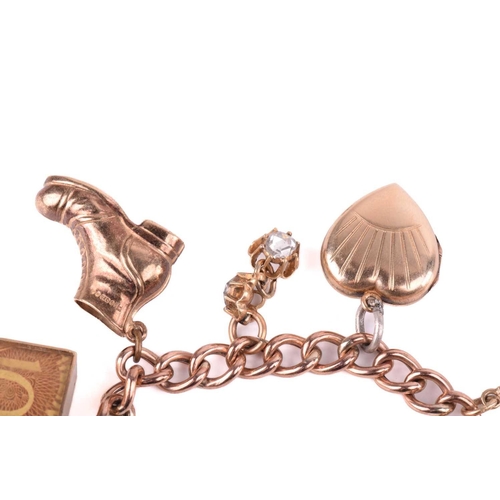 78 - A charm bracelet in 9ct rose gold, consisting of a curb link chain, suspending with a collection of ... 