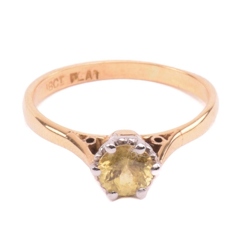 83 - Two gem-set rings; featuring a yellow sapphire solitaire ring, centred with a circular-cut yellow sa... 