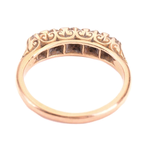 9 - A diamond five stone carved half hoop ring, set with a graduated row of old cut diamonds with a tota... 