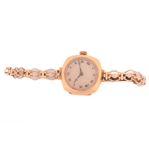 101 - Two shell cameo brooches and a ladies wristwatch, the watch stamped '375' to case back, with strap m... 