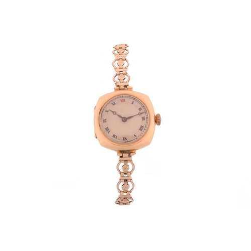 101 - Two shell cameo brooches and a ladies wristwatch, the watch stamped '375' to case back, with strap m... 