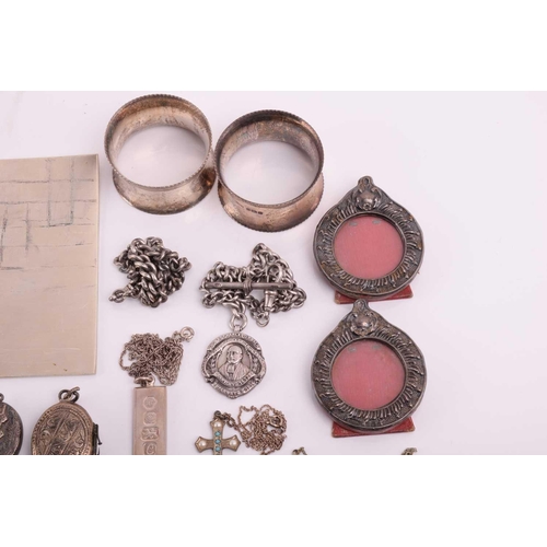106 - A collection of miscellaneous silver and white metal items, including a hallmarked silver medal on a... 