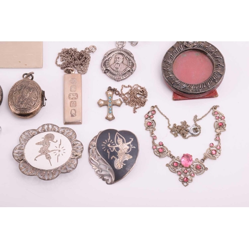 106 - A collection of miscellaneous silver and white metal items, including a hallmarked silver medal on a... 
