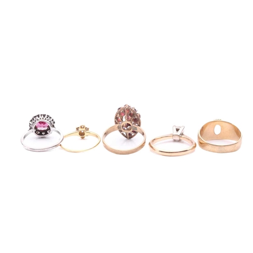108 - A collection of five rings, including a synthetic ruby and diamond cluster ring, ring size M, a diam... 