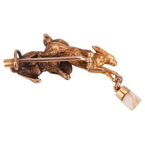 109 - An Edwardian hare and rabbit brooch, realistically crafted and engraved with fur texture, embellishe... 