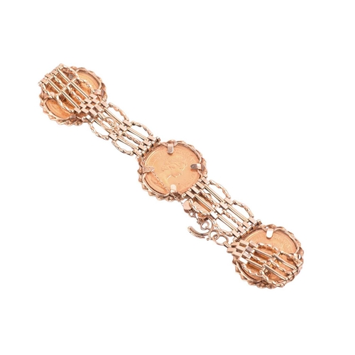 110 - A 9ct gold gate link bracelet mounted with three half sovereigns, comprising three Elizabeth II 1982... 