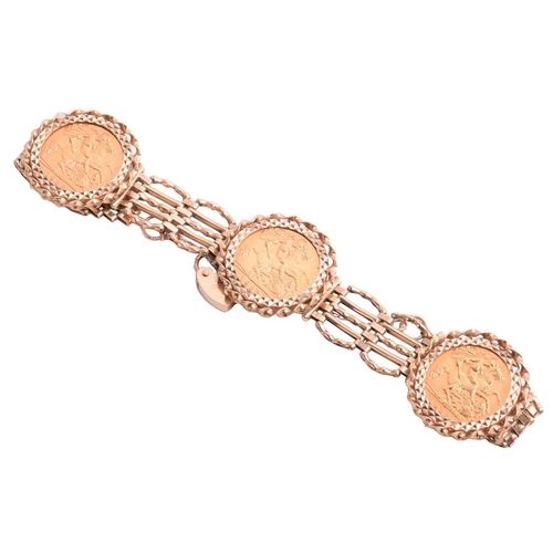 110 - A 9ct gold gate link bracelet mounted with three half sovereigns, comprising three Elizabeth II 1982... 
