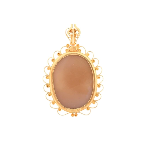 116 - A hardstone cameo pendant featuring a profile of a lady, the filigree frame marked '750' and 'k.22',... 