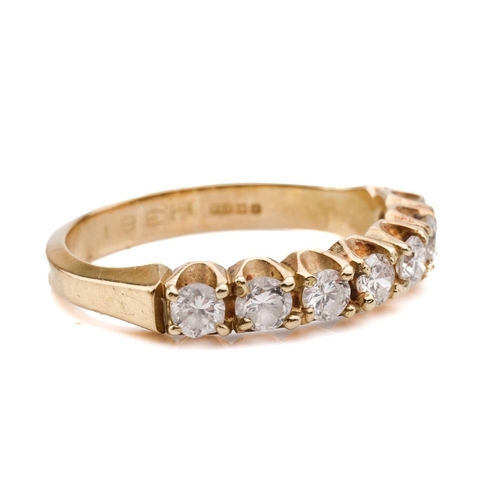 120 - A diamond half eternity ring, set with a row of seven round brilliant cut diamonds with a total esti... 
