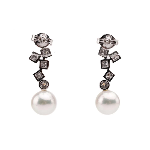 16 - Mikimoto. A pair of Mikimoto pearl and diamond pendant earrings; comprising a drop of five princess ... 