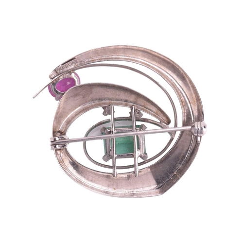 26 - A Modernist gem-set abstract brooch in 14ct white gold, a swirl bevelled shape partially in Florenti... 