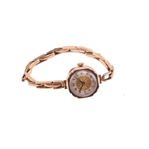 329 - A 9ct gold lady's wristwatch on a 9ct metal core bracelet with hand-wound Swiss movement in a 9ct go... 