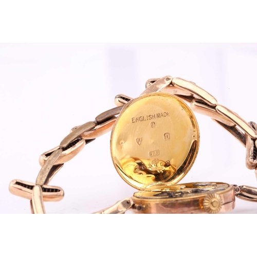 329 - A 9ct gold lady's wristwatch on a 9ct metal core bracelet with hand-wound Swiss movement in a 9ct go... 