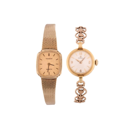 342 - A lady's Omega 9ct gold dress watch and a Tissot 9ct gold dress watch. It features a manual wind Swi... 