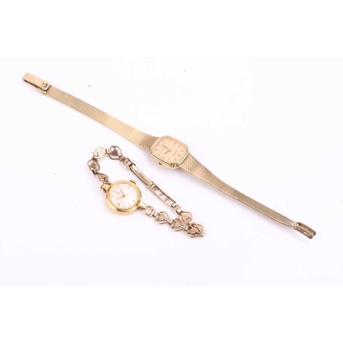 342 - A lady's Omega 9ct gold dress watch and a Tissot 9ct gold dress watch. It features a manual wind Swi... 
