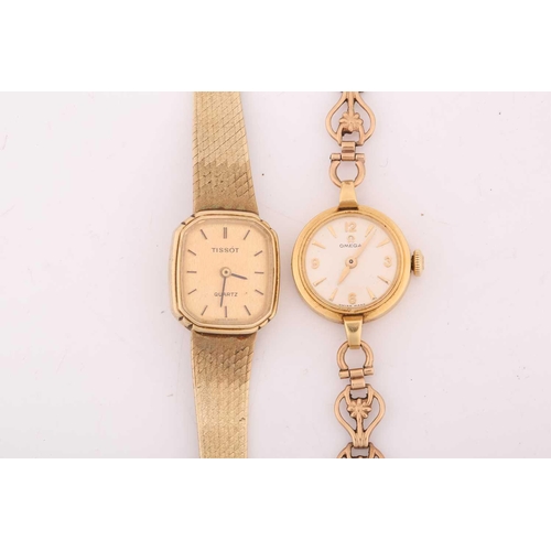 342 - A lady's Omega 9ct gold dress watch and a Tissot 9ct gold dress watch. It features a manual wind Swi... 