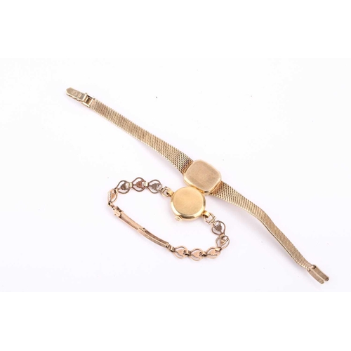 342 - A lady's Omega 9ct gold dress watch and a Tissot 9ct gold dress watch. It features a manual wind Swi... 