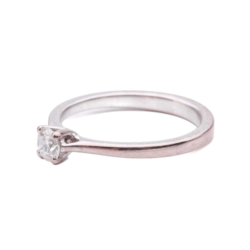 35 - A diamond solitaire ring, set with a round brilliant cut diamond with an estimated weight of 0.35ct,... 