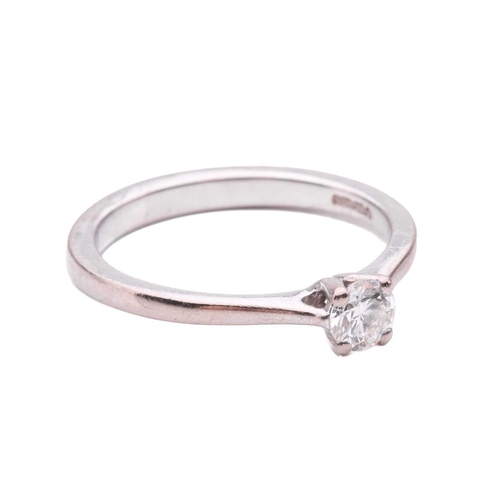 35 - A diamond solitaire ring, set with a round brilliant cut diamond with an estimated weight of 0.35ct,... 
