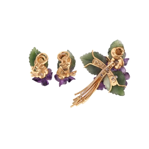 4 - A suite of carved nephrite and amethyst brooch and earrings designed as floral sprays; the brooch bl... 