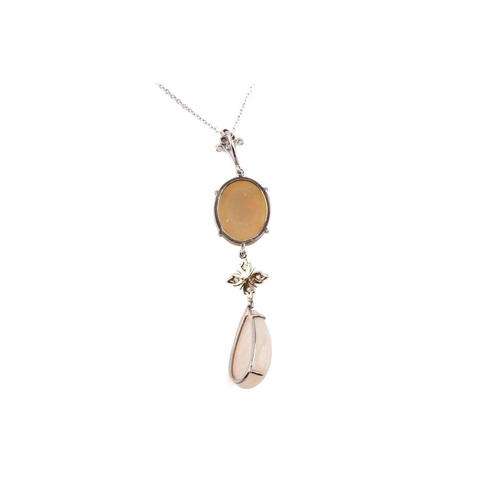 5 - An opal and diamond pendant set with a yellow-brown fire opal suspending a floral motif set with ros... 