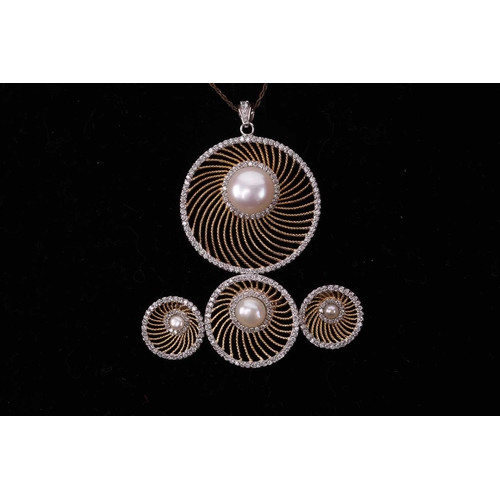 61 - A silver and silver gilt necklace with earrings and ring en suite; of swirling rope twist wirework d... 
