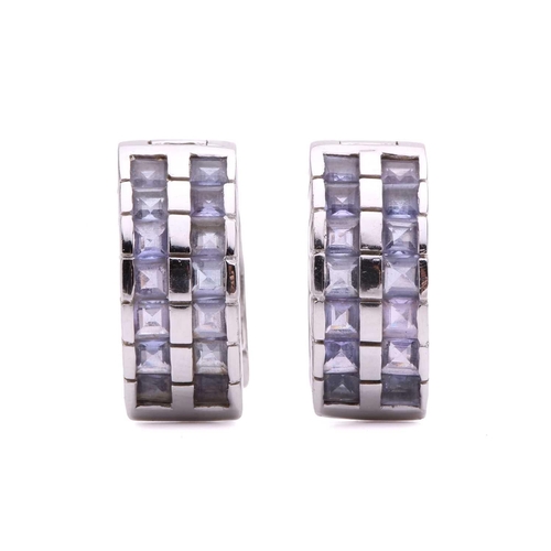 63 - A collection of three pairs of earrings and a ring, including a pair of diamond drop shape cluster e... 