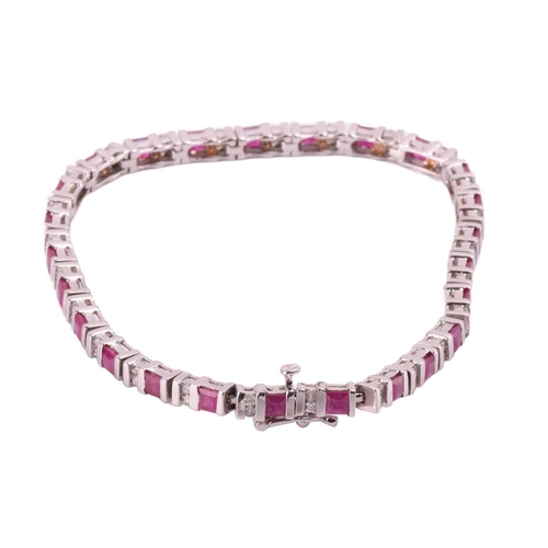 71 - A tennis bracelet set with diamonds and synthetic rubies, articulated mounts alternating with square... 