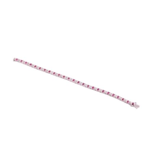 71 - A tennis bracelet set with diamonds and synthetic rubies, articulated mounts alternating with square... 