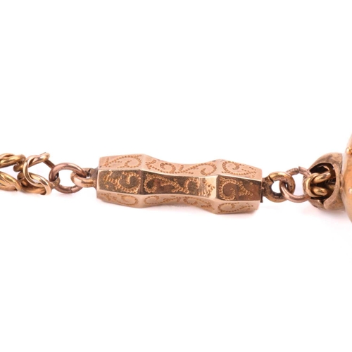 76 - An Etruscan Revival necklace, centred with a sphere pendant with twisted cable work and bead details... 