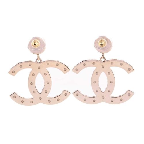 81 - Chanel - a pair of interlocking CC logo drop earrings embellished with faux pearls, ear post and bac... 