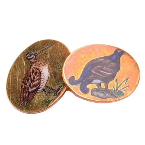 93 - A pair of game birds cufflinks in 9ct yellow gold, each oval panel depicting an enamelled scene of a... 