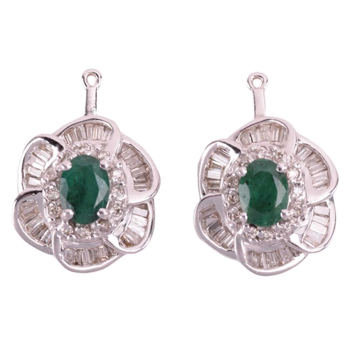 96 - A suite of emerald and diamond flowerhead pendants; two identical flowerhead clusters each centred w... 