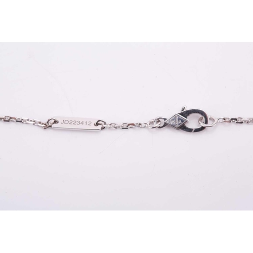 97 - Van Cleef & Arpels - a diamond-set lotus openwork pendant on chain, mini model, flowerhead motif set... 