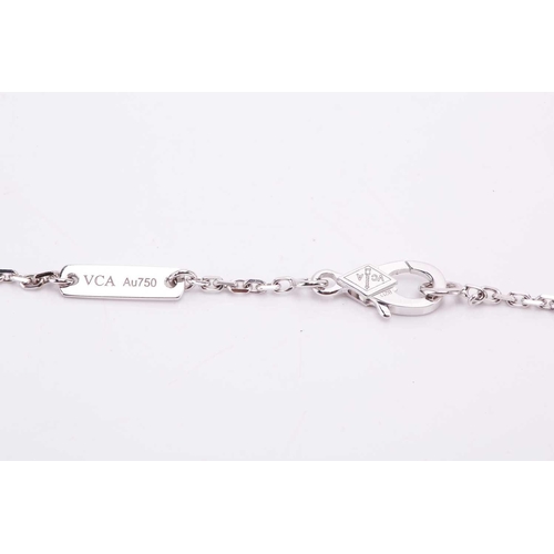 97 - Van Cleef & Arpels - a diamond-set lotus openwork pendant on chain, mini model, flowerhead motif set... 